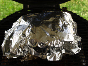 Wrapping the roast in tin foil to retain the moisture and help raise the temperature to195-205 degrees Fahrenheit.