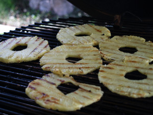 Grilling some fresh pineapple rings.