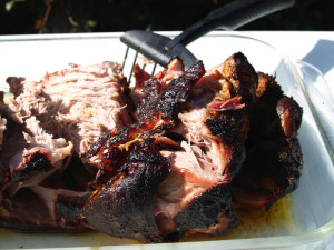 Pulling the roast apart using meat rakes from meatrakes.com.